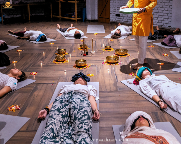 Yoga students practicing mindfulness in the Yoga Hall