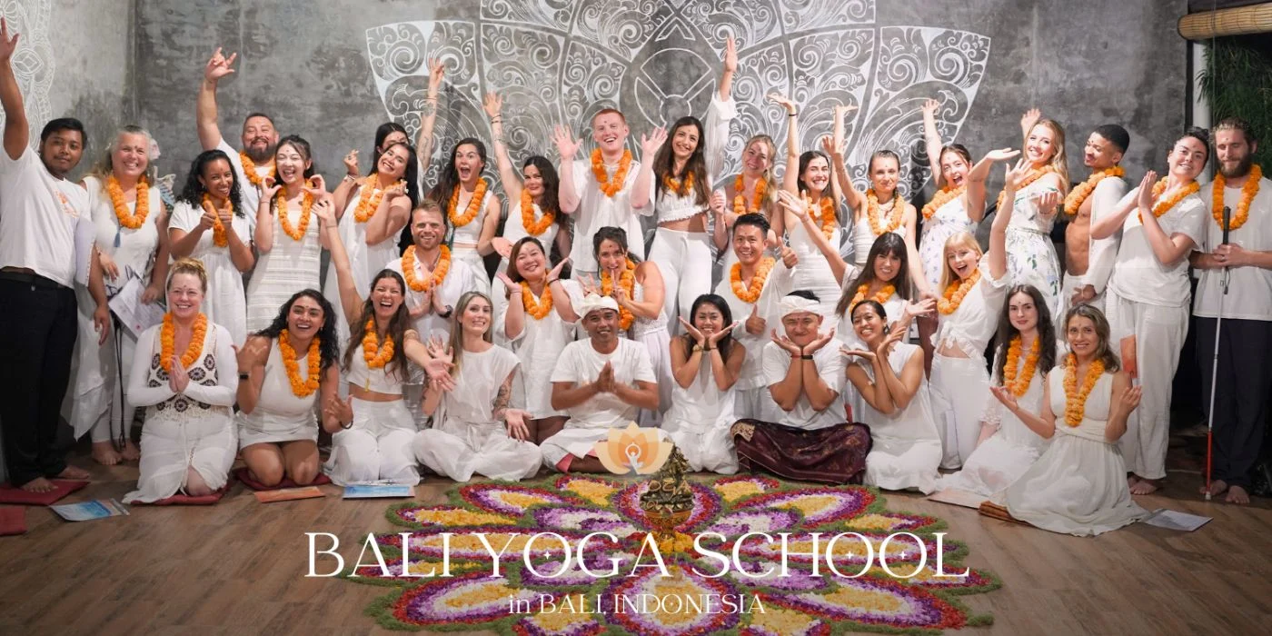Students practicing yoga at Himalayan Yoga Association yoga school
