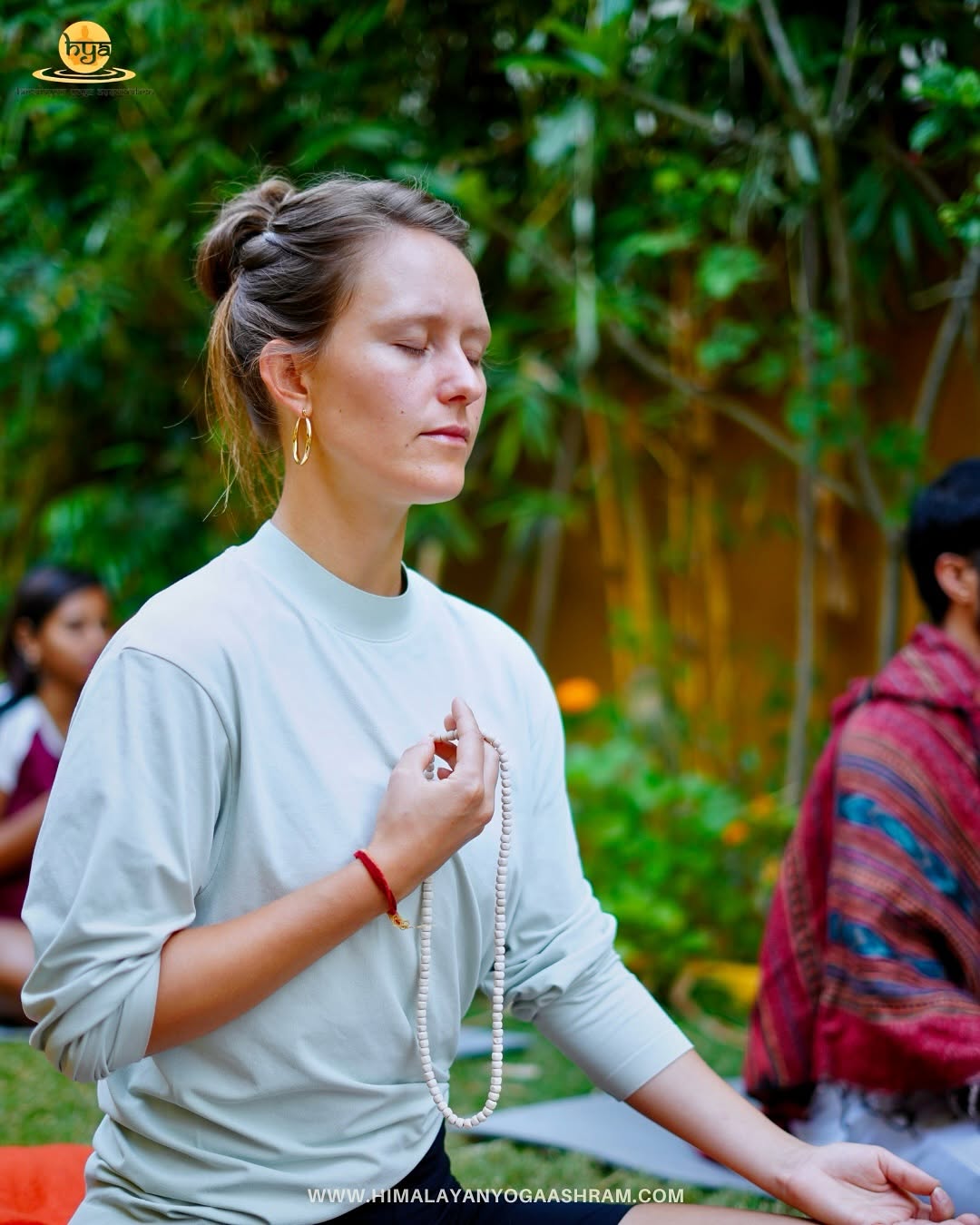 Students practising meditation during a meditation teacher training course in Rishikesh