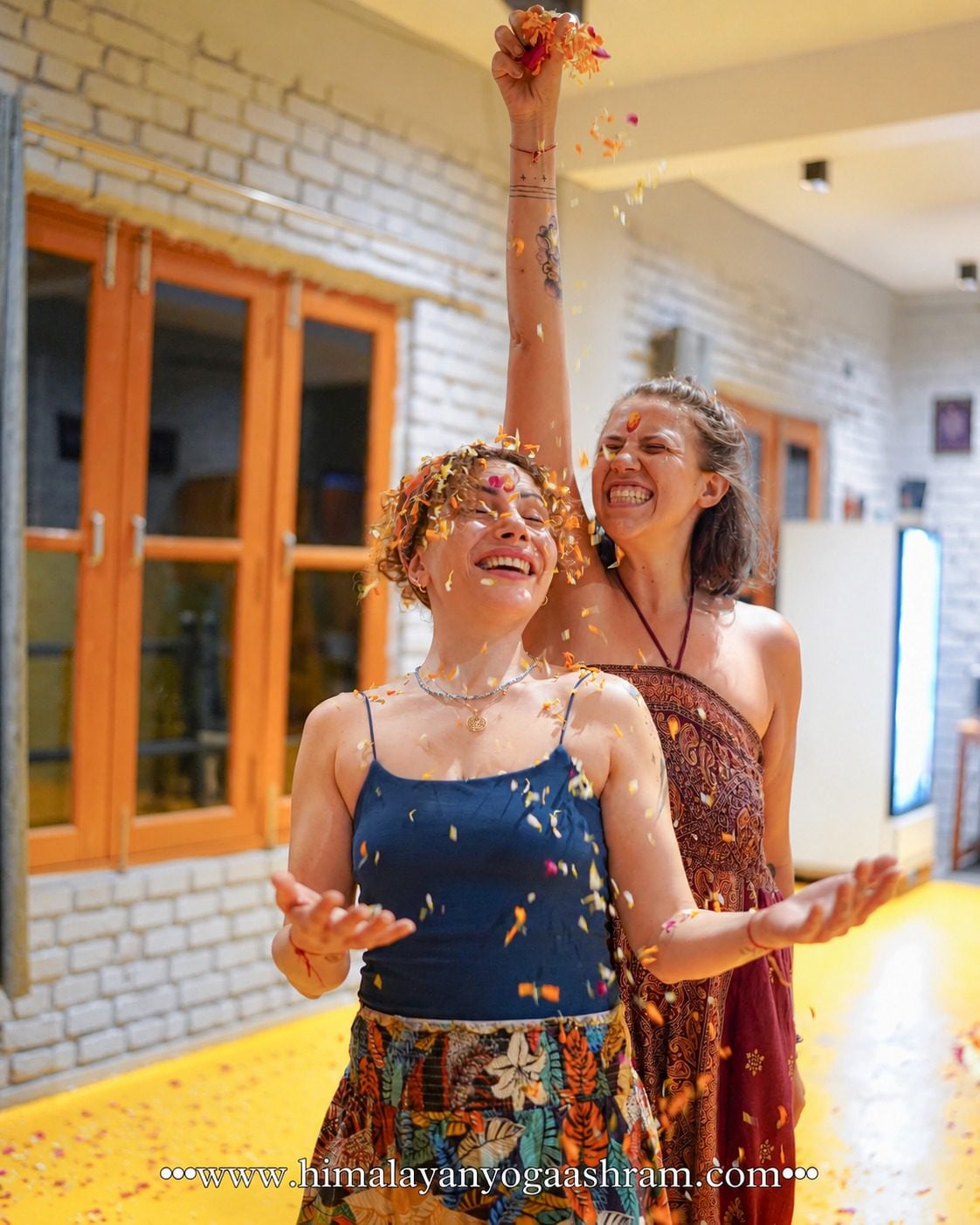 Students celebrating together during their yoga journey in Rishikesh