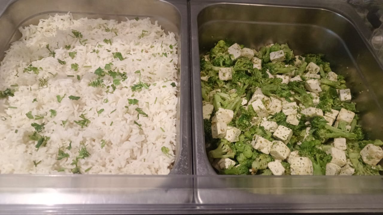 Clean kitchen counters with prepared meals.