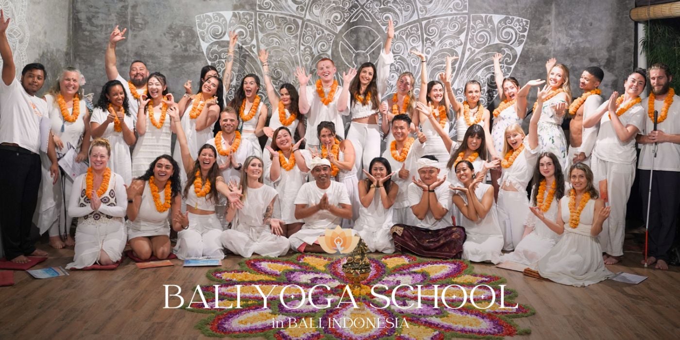Students practicing yoga at Himalayan Yoga Association yoga school
